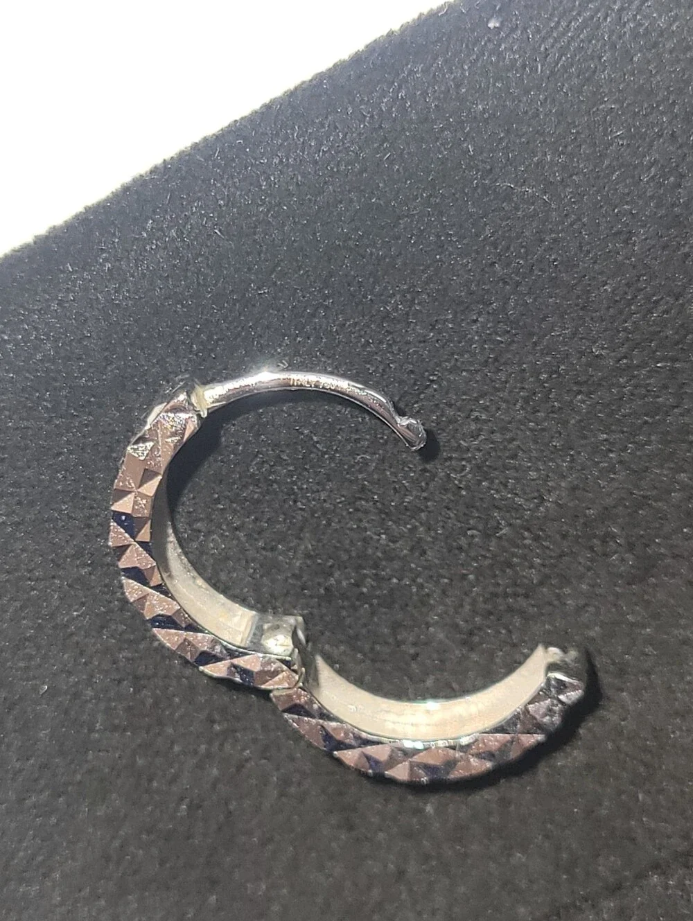 18 KT White Gold Diamond Cut Infinity Earrings